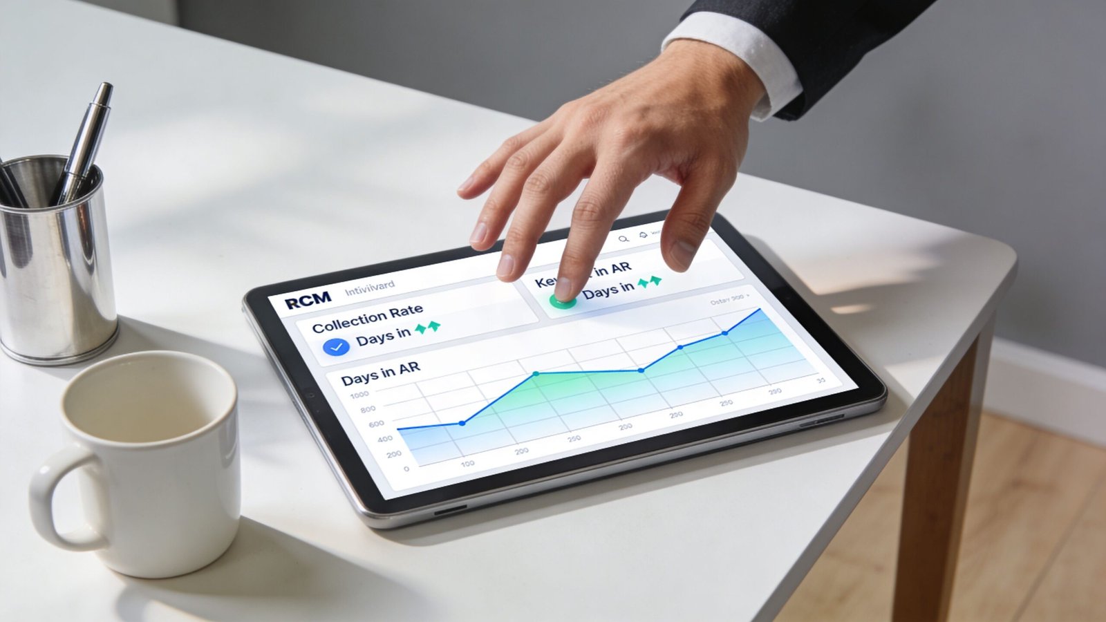 A professional using a tablet to review revenue cycle management financial charts and performance data analytics.